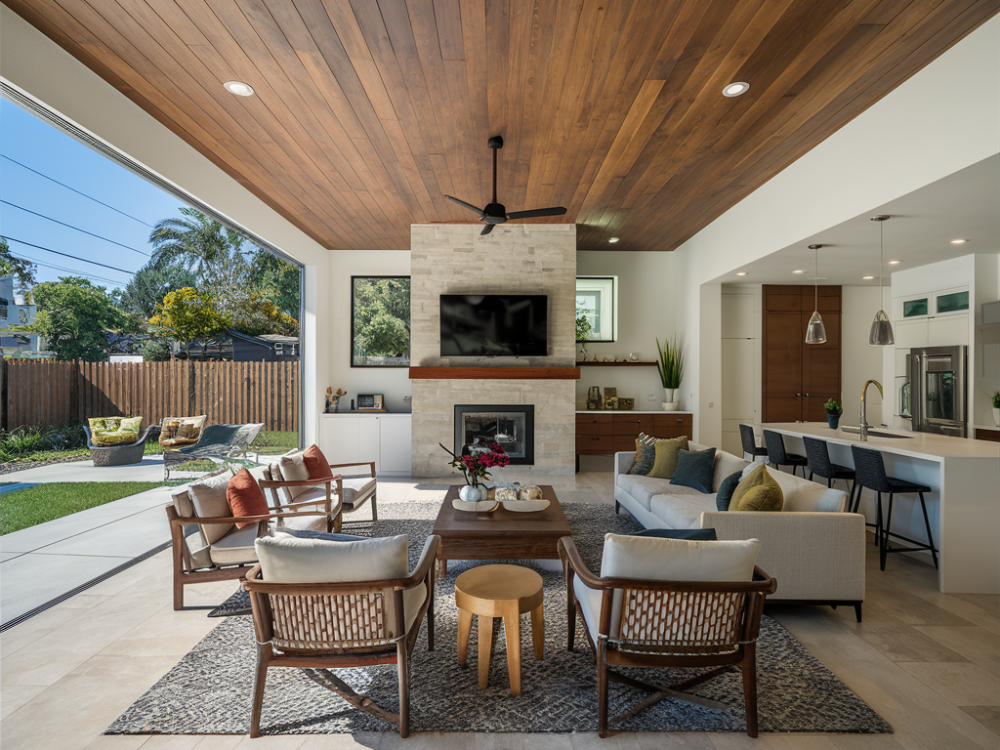 a close sunroom created by extending the home's kitchen space and converted into a living space