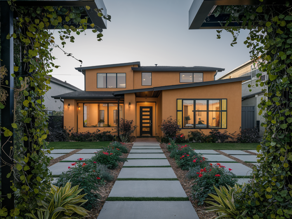 A beautifully externally renovated burbank home with newly installed exterior paint, pergolas and walkway with top-tier landscaping & gardening